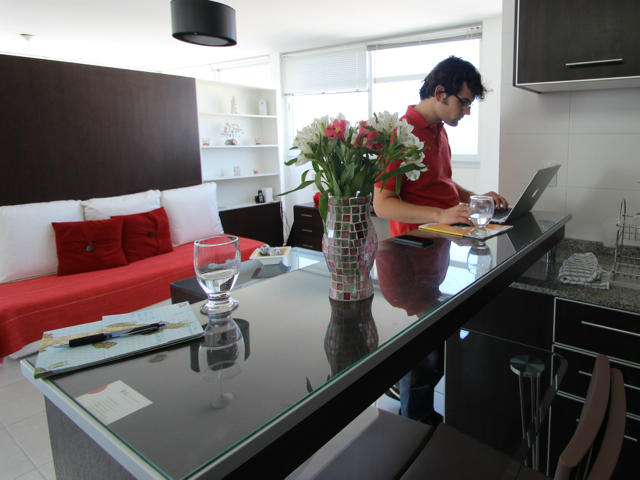 working from the breakfast bar at our first apartment